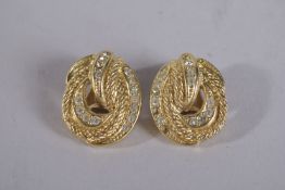 A GOOD PAIR OF DIOR GILT AND C Z EAR CLIPS . Stamped C. Dior Guernsey.