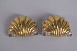 VALENTINO. A PAIR OF GILT METAL SHELL EAR CLIPS, 2ins., signed.