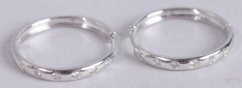 A PAIR OF 18CT WHITE GOLD AND DIAMOND HOOP EARRINGS.
