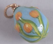 A 14CT GOLD RUSSIAN ENAMEL LILY EGG PENDANT.