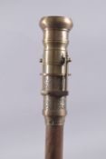 A TELESCOPE HANDLE WALKING STICK. 39ins long.