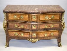 A LARGE 18TH CENTURY LOUIS XVI BOMBE FRONTED COMMODE with thick marble top, three long drawers