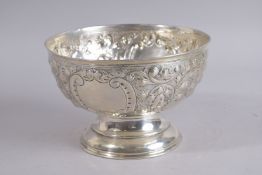 A CIRCULAR SILVER ROSE BOWL with repousse decoration. 8ins diameter. London 1978. Weight 8ozs.