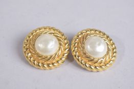 A PAIR OF CHANEL GILT METAL AND PEARL CLIP ON EARRINGS. 3cm diameter.