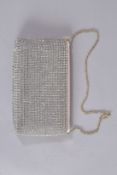 AN ESCADA DIAMANTE SILVER EVENING BAG on a chain, in a dust wrapper. 8ins high.