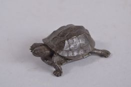 A SMALL JAPANESE BRONZE ARTICULATED TURTLE. 1.5ins.