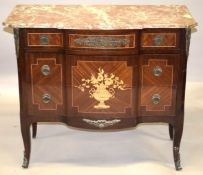 A LOUIS XVI STYLE INLAID MARBLE TOP COMMODE with shaped front, three long drawers with floral panels