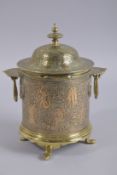 A FINE LARGE 19TH CENTURY PERSIAN QAJAR STYLE BRASS AND COPPER TEA CADDY, 24cm high.