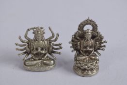 TWO MINIATURE WHITE METAL BUDDHAS, (2).