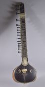 A VERY FINE 19TH CENTURY INDIAN BONE MOUNTED SITAR MUSICAL INSTRUMENT, 12.5cm long.