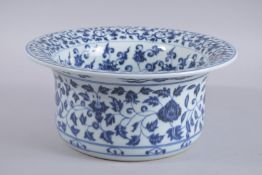 A CHINESE BLUE AND WHITE PORCELAIN BASIN, the interior with lucky symbols, 31cm diameter.