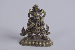 A SMALL TIBETAN GILT BRONZE DEITY, 6cm high.