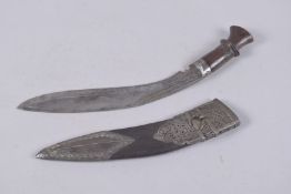 A NEPALESE METAL AND LEATHER MOUNTED KUKRI, 35cm long.