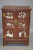 A VERY FINE CHINESE RED LACQUERED CABINET, with inlaid ivory figural decoration with birds and