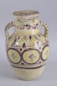 A RARE LARGE 18TH CENTURY NORTH AFRICAN TWIN HANDLE JAR, 31cm high.