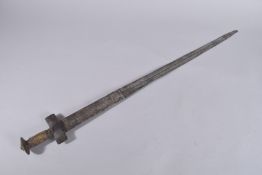 AN OMANI EMIRATI AFRICAN SWORD, with leather wrapped and reptile skin grip, 89cm long.