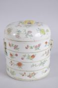 A 19TH CENTURY CHINESE FAMILLE ROSE PORCELAIN FOOD BOX AND COVER, painted with fruit and flora