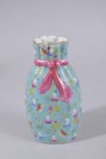 A CHINESE TURQUOISE GROUND FAMILLE ROSE PORCELAIN SACK-SHAPED VASE, painted with gourds and bats,