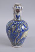 A FINE 19TH CENTURY PERSIAN QAJAR GLAZE POTTERY VASE, with animal scenes, 28cm high.