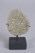 A FINE 19TH CENTURY CHINESE CARVED AND PIERCED JADE PLAQUE, depicting a deer and crane amongst