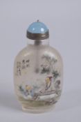 A CHINESE REVERSE GLASS PAINTED AND GOLD SPLASH SNUFF BOTTLE, 9.5cm high.