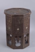 A 19TH CENTURY SYRIAN OCTAGONAL WOODEN TABLE, 48cm high.
