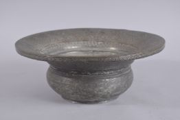 A 17TH-18TH CENTURY PERSIAN SAFAVID TINNED COPPER BASIN, 32cm high.