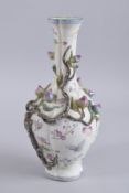 A CHINESE RELIEF DECORATED PEACH BLOSSOM VASE, 31cm high.
