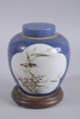 A CHINESE BLUE GROUND PORCELAIN GINGER JAR AND COVER ON MARBLE INSET HARDWOOD STAND, the base with