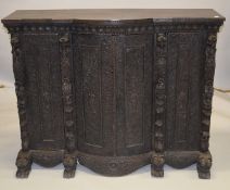 A FINE AND LARGE 19TH CENTURY ANGLO INDIAN CARVED HARDWOOD SIDE CABINET, with carved decoration