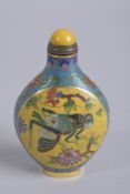 A CHINESE BLUE AND YELLOW CLOISONNE SNUFF BOTTLE, 9cm high.