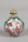 A CHINESE PEKING ENAMEL SNUFF BOTTLE AND STOPPER, finely painted with panels of landscape scenes,