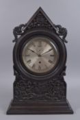 AN EARLY 20TH CENTURY CHINESE SHIPS CLOCK IN HARDWOOD CASE; CHS.J.GAUPP & CO, HONG KONG, 25cm high.