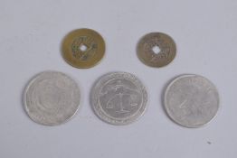 A COLLECTION OF FIVE WORLD COINS.