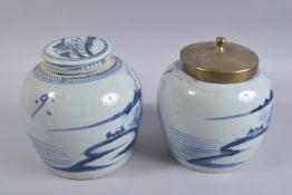 A NEAR PAIR OF CHINESE BLUE AND WHITE PORCELAIN JARS AND COVERS, (one with brass replacement cover),