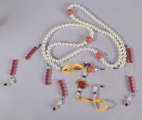 A DECORATIVE SET OF CHINESE COURT BEADS.