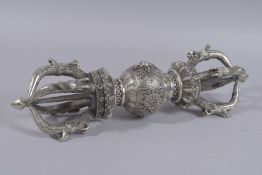A VERY LARGE TIBETAN WHITE METAL VAJRA, 46cm long.