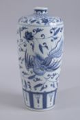 A TALL CHINESE BLUE AND WHITE PORCELAIN PHOENIX VASE, base with six-character mark, 31cm high.