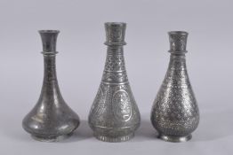 A COLLECTION OF THREE 18TH-19TH CENTURY INDIAN BIDRI BOTTLE VASES / HUQQA BASES, tallest 24cm