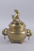 A 19TH CENTURY CHINESE BRONZE BRONZE TWIN HANDLE CENSER AND COVER, 32cm high.