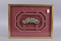 A CHINESE GILDED BLACK LACQUER PANEL, framed and glazed, panel 18cm wide.