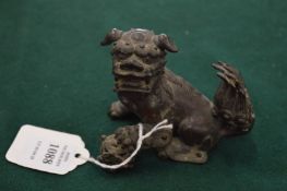 A Chinese bronze model of a Qilin.