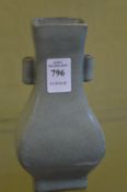 A Chinese celadon glazed small vase.