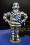 A cast metal Michelin man.
