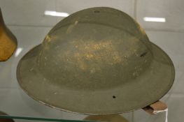 A military tin helmet.