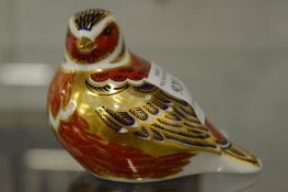 A Royal Crown Derby model of a partidge.