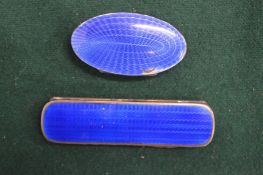 A silver and enamel toothpick box and a silver and enamel pill box.