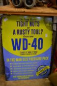 A novelty metal advertising sign for WD-40.