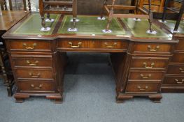 Reproduction mahogany pedestal desk.