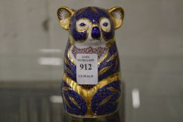 A Royal Crown Derby model of a seated koala.
